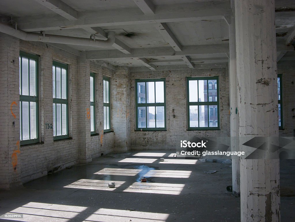 Construction site for conversion for residential living in an abandoned warehouse.  Horizontal, nobody.